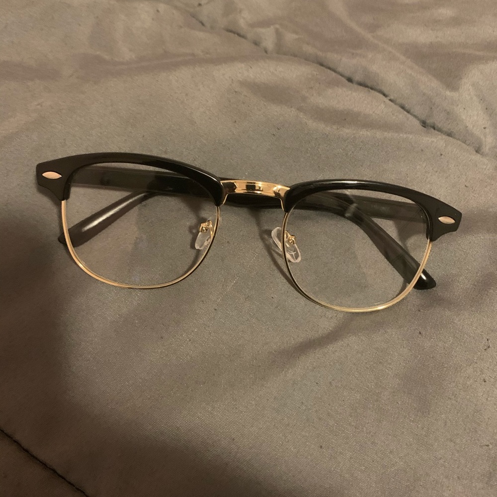 Black and gold frame clear glasses